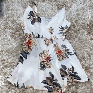 MURA BOUTIQUE FLORAL ROMPER